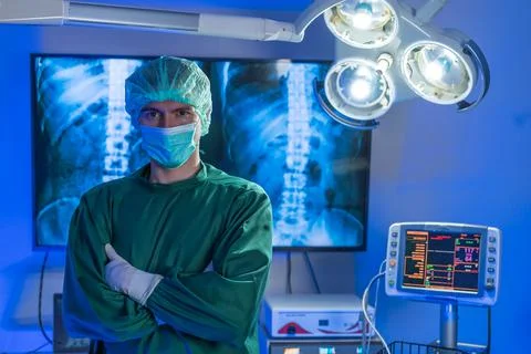 Doctor Standing in Surgical Room Stock Photos