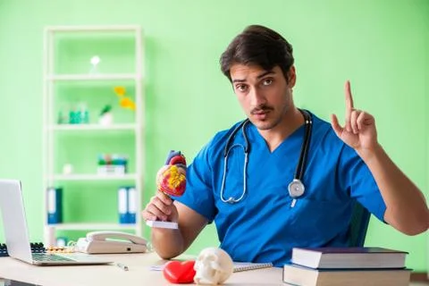 Doctor student explaining heart problems Stock Photos