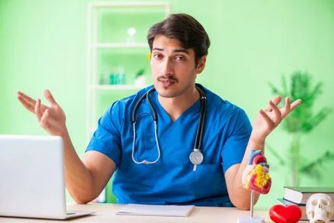 Doctor student explaining heart problems Stock Photos