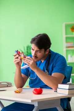 Doctor student explaining heart problems 스톡 사진