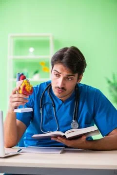 Doctor student explaining heart problems Stock Photos