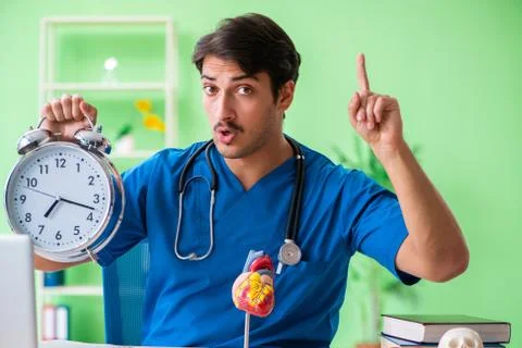 Doctor student explaining heart problems Stock Photos