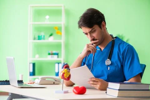 Doctor student explaining heart problems Stock Photos