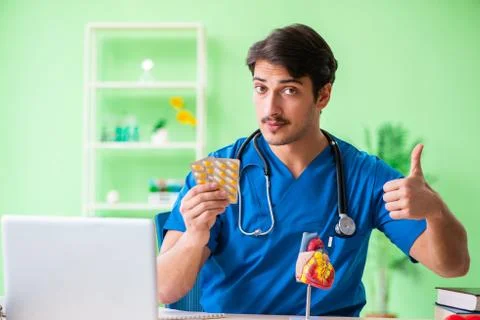 Doctor student explaining heart problems Stock Photos