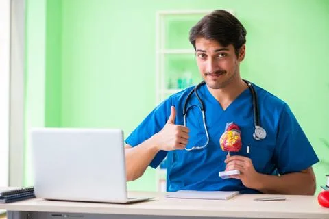 Doctor student explaining heart problems Stock Photos