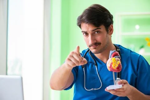 Doctor student explaining heart problems Stock Photos