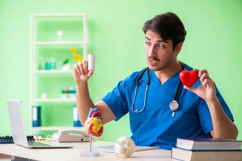 Doctor student explaining heart problems Stock Photos