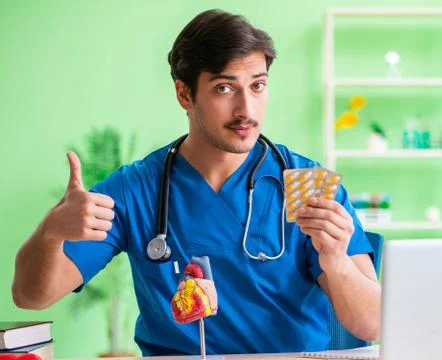 Doctor student explaining heart problems Stock Photos