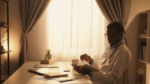 Doctor study medicine training reading book tea Stock Footage 201666985