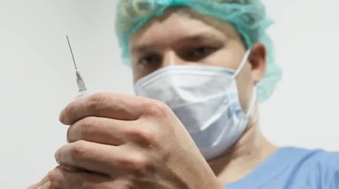 Doctor with syringe Stock Footage 17950848