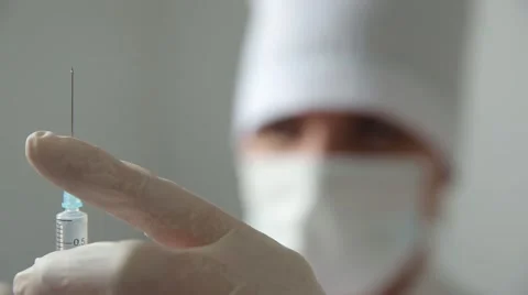 Doctor with a syringe Stock Footage 50407544