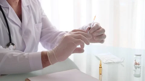 Doctor with syringe Stock Footage 127394020