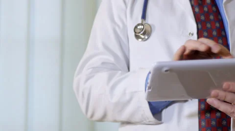 Doctor with tablet computer, tracking shot Stock Footage 36583719