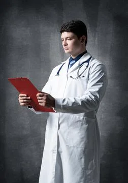 Doctor with tablet for documents Stock Photos