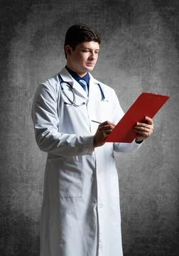 Doctor with tablet for documents Stock Photos