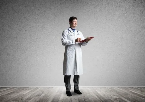 Doctor with tablet Stock Photos