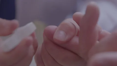 Doctor taking blood sample of small child patient Stock Footage 254777816