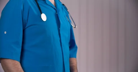 Doctor taking bribes from patients Stock Footage 87910741