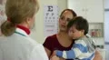 Doctor talking to a Hispanic mother HD Footage