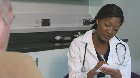 Doctor talking with patient Stock Footage 24282421