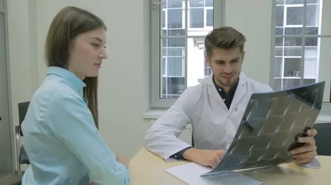 Doctor talking to patient Stock Footage 53851150