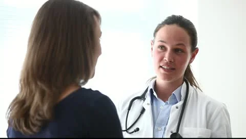 Doctor talks to patient Stock Footage