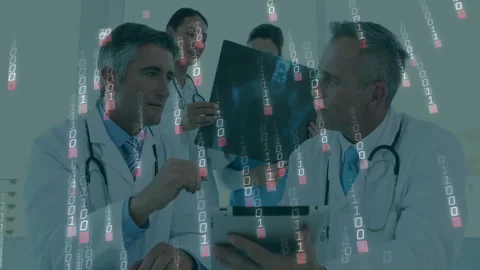 Doctor tapping tablet and explaining Xray while merging binary records for Stock Footage 312115987