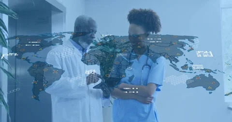 Doctor tapping tablet and nurse pointing initiating map data overlay for Stock Footage 318046825
