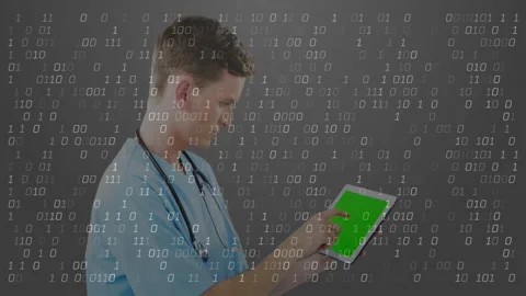 Doctor tapping tablet screen generating binary code across grey backdrop for Stock Footage 312415614