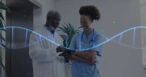 Doctor tapping tablet screen, nurse pointing at genetic data with DNA helix Stock Footage 315418888