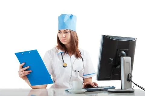 Doctor thinks the computer Stock Photos