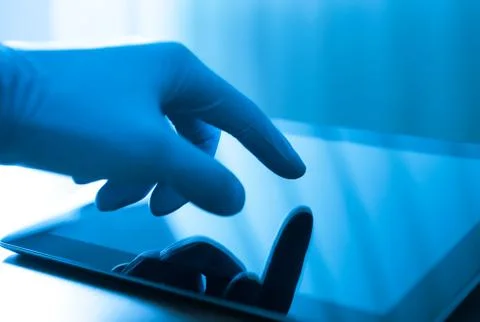 Doctor touching on digital tablet screen Stock Photos
