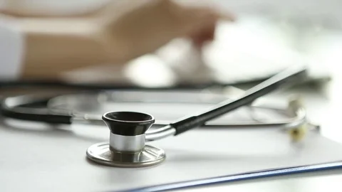 The doctor is typing on the keyboard. Stock Footage 83274267
