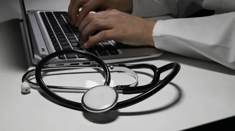 Doctor typing on laptop Stock-Footage 39521968