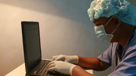 Doctor updates patient data Stock Footage 710285