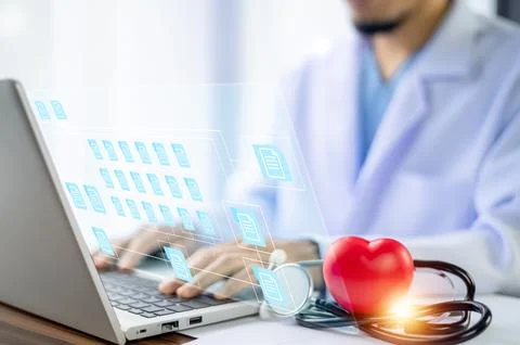 Doctor use computer connection server data base document folders of patient.. Stock Photos