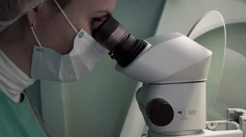 Doctor use microscope for blood analysis at modern medical laboratory Stock Footage 59520251