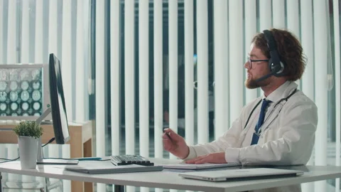 Doctor Using Advanced Technology for Diagnosis and Treatment in Digital World Stock Footage 291345270