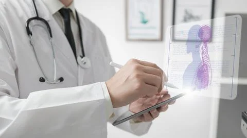 Doctor using AI for human analysis 写真素材