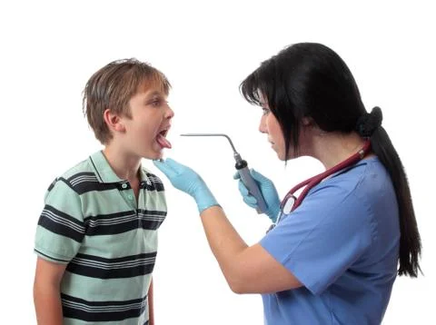 Doctor using bent arm illuminator Stock Photos