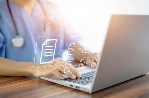 Doctor using computer Document Management System (DMS), online documentation  Stock Photos
