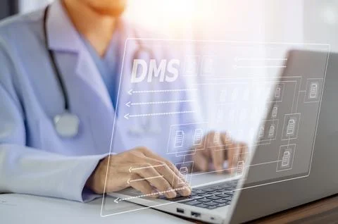 Doctor using computer Document Management System (DMS), online documentatio.. Stock Photos
