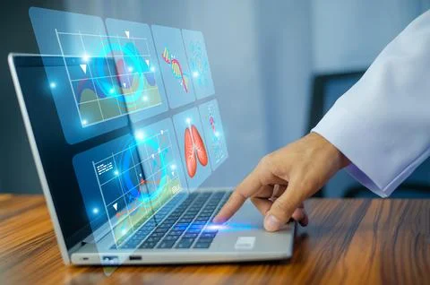 Doctor using computer loading document data and analysis for planning patient Stock Photos