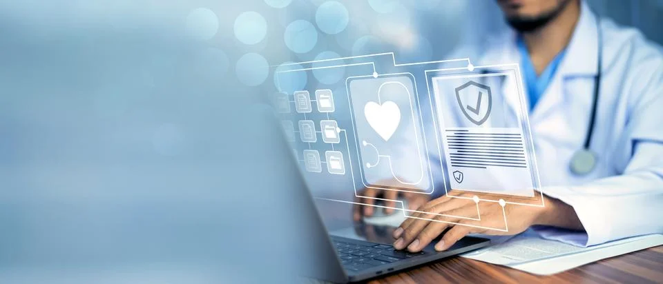 Doctor using computer in office. Stock Photos