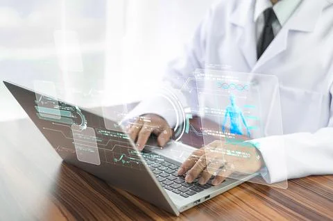Doctor using computer research data for treatment patient and document reco.. Stock Photos