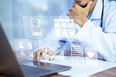 Doctor using computer working in hospital, Doctor using computer checking d.. Stock Photos