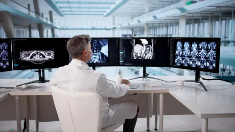 Doctor Using Desktop Computer Stock Footage 329683384