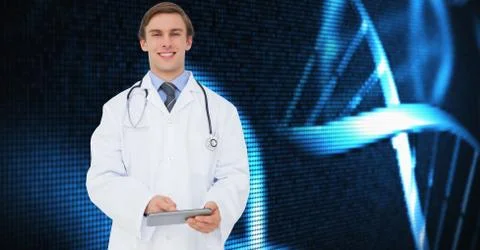Doctor using digital tablet against medical backgorund Stock Photos