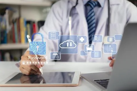 Doctor using digital tablet with password padlock and cloud data icons. Con.. Stock Photos
