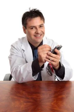 Doctor using an electronic PDA Stock Photos